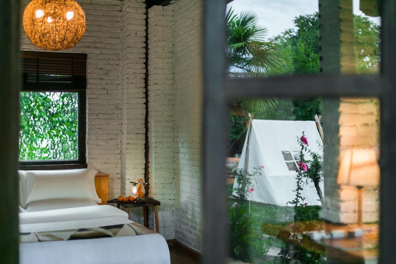 Adonis Inn Lijiang 麗江市 エクステリア 写真
